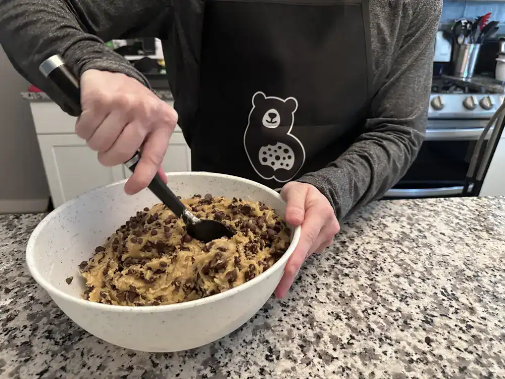 Mixing chocolate chip cookies by hand in my cottage bakery in garland, texas